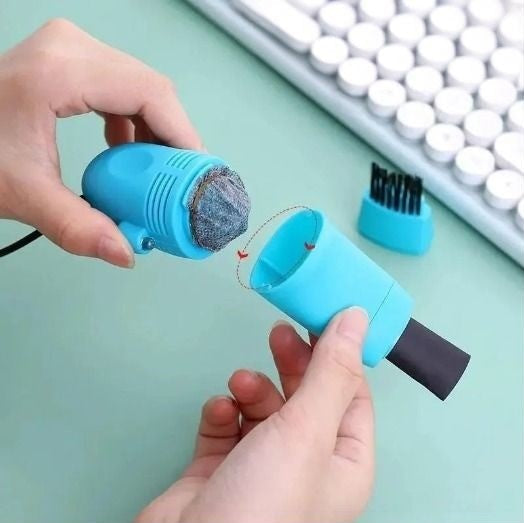 Compact Mini Vacuum Cleaner for Desk and Keyboard Cleaning