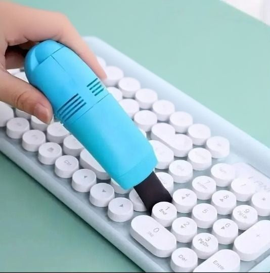 Compact Mini Vacuum Cleaner for Desk and Keyboard Cleaning