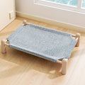 Elevated Wooden Pet Bed with Breathable Woven Cover for Cats and Small Dogs