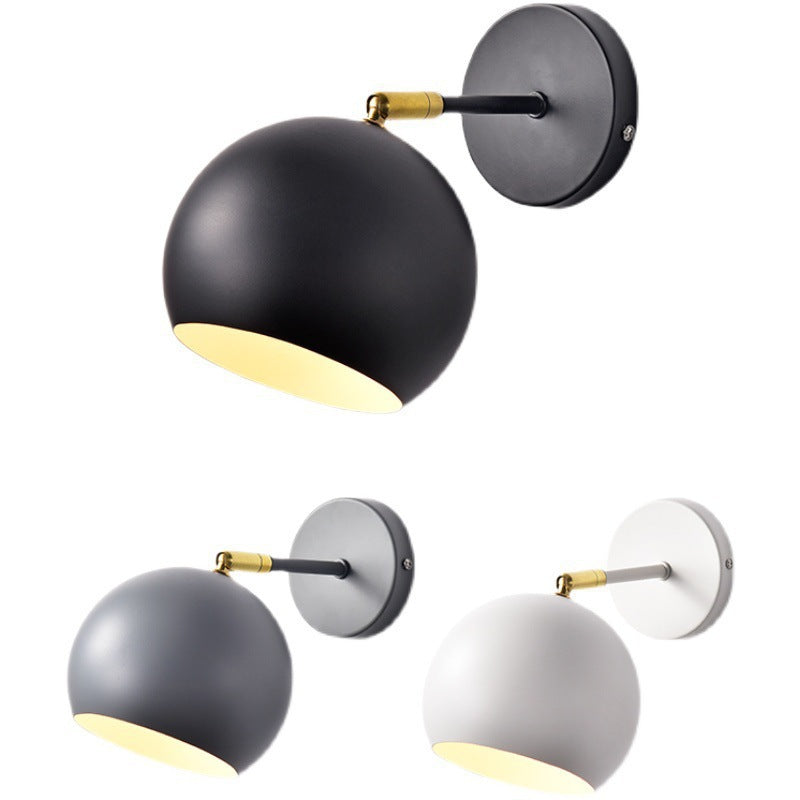 Adjustable Matte Metal Globe Wall Lamp with Brass Pivot Arm | Thrascher