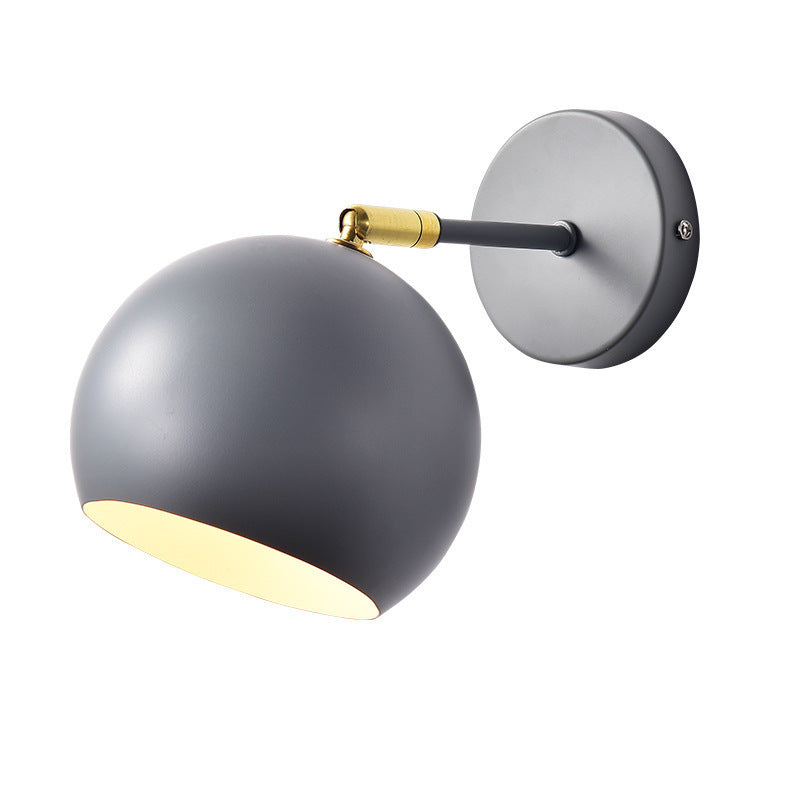 Adjustable Matte Metal Globe Wall Lamp with Brass Pivot Arm | Thrascher