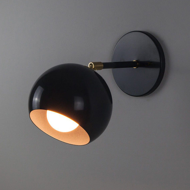Adjustable Matte Metal Globe Wall Lamp with Brass Pivot Arm | Thrascher
