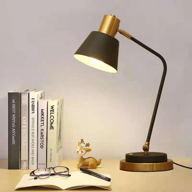 Adjustable Metal Desk Lamp with Swivel Arm and Brass Accents | Thrascher