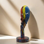 Artful Decoration in the Form of a Contemplative Figure | Thrascher
