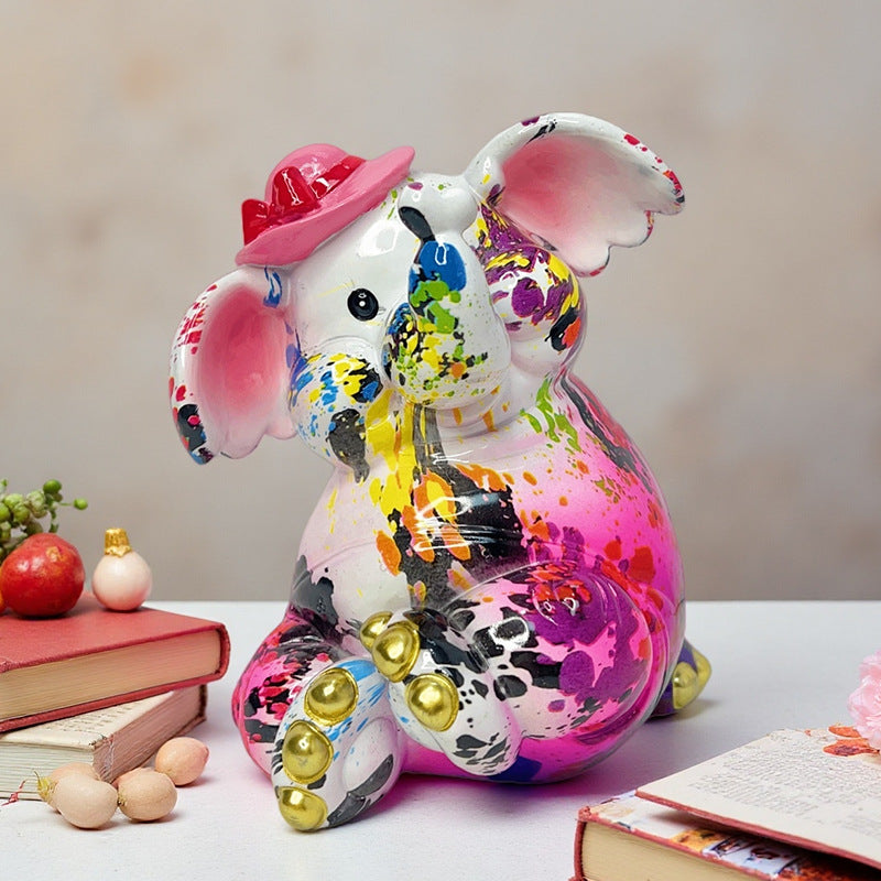 Artistic Elephant Figure with Football Motif | Thrascher