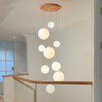 Cascading Glass Globe Pendant Lamp with Wooden Ceiling | Thrascher