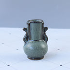 Elegant Ceramic Vase with Artistic Design | Thrascher