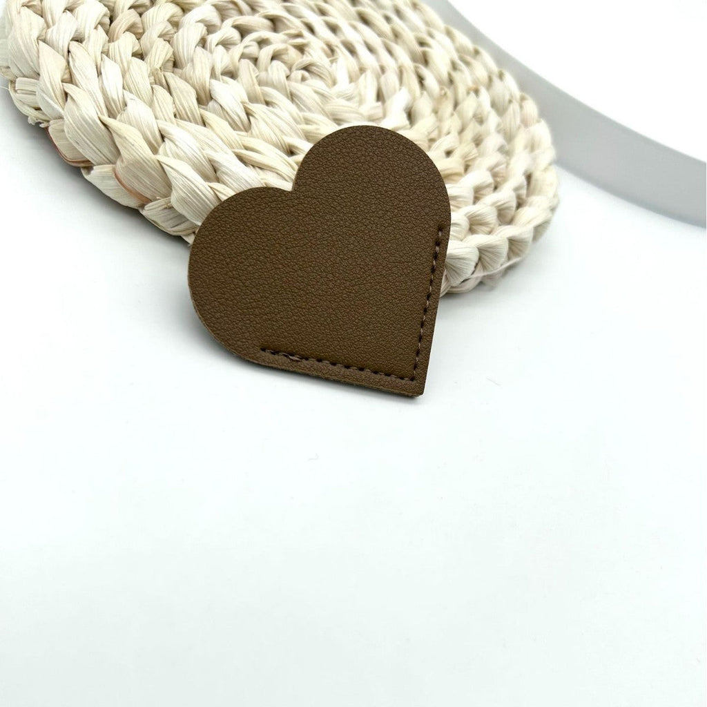 Heart-Shaped Leather Accessory | Thrascher