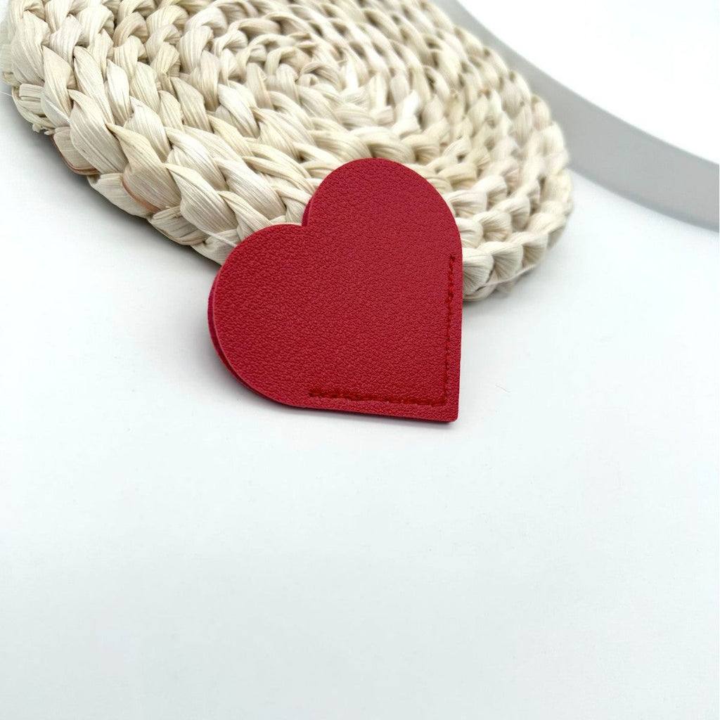 Heart-Shaped Leather Accessory | Thrascher