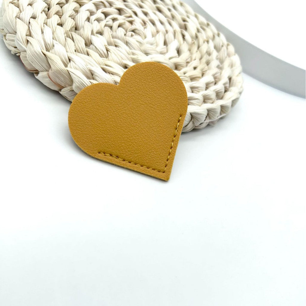 Heart-Shaped Leather Accessory | Thrascher