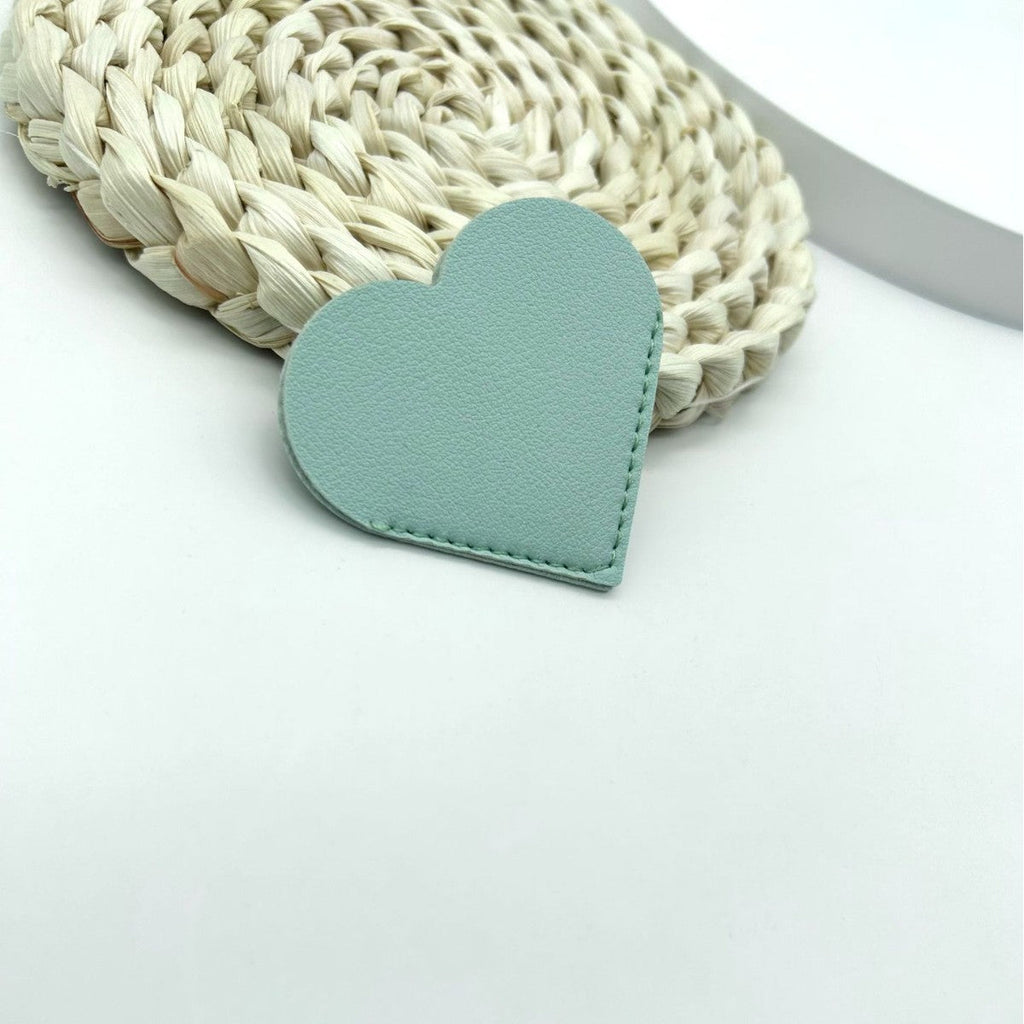 Heart-Shaped Leather Accessory | Thrascher