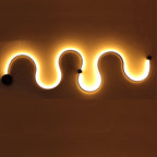Sculptural LED Wave Wall Lamp | Thrascher