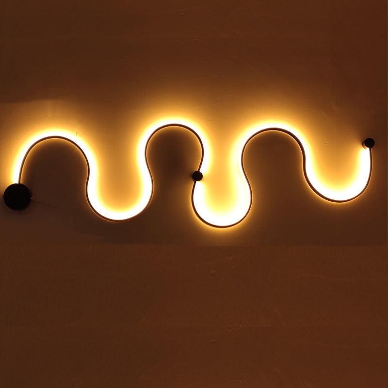 Sculptural LED Wave Wall Lamp | Thrascher