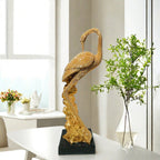 Shiny Parrot Figure on Log | Thrascher