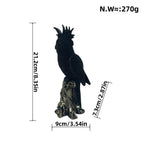 Shiny Parrot Figure on Log | Thrascher