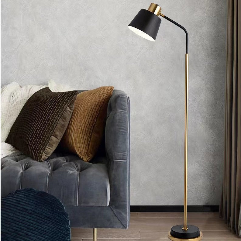 Slim Brass Torchiere Floor Lamp with Tilted Cone Shade and Adjustable Neck | Thrascher