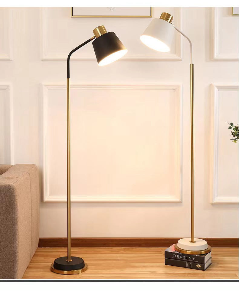 Slim Brass Torchiere Floor Lamp with Tilted Cone Shade and Adjustable Neck | Thrascher