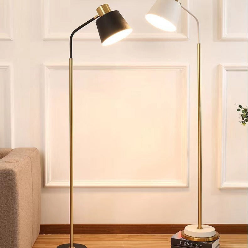 Slim Brass Torchiere Floor Lamp with Tilted Cone Shade and Adjustable Neck | Thrascher