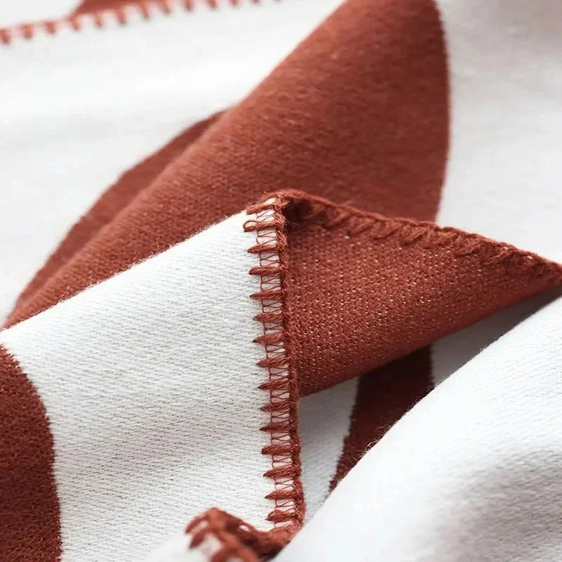 Sorbeda Throw Blanket