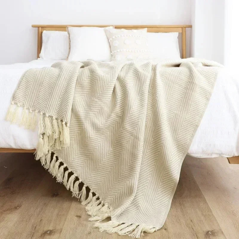 Torura Throw Blanket