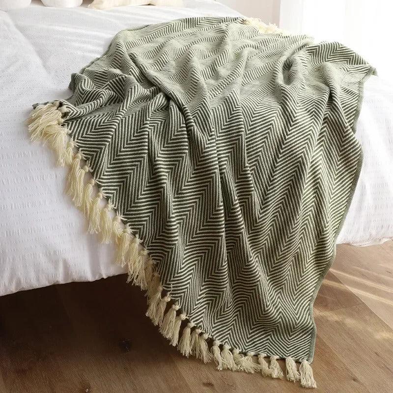 Torura Throw Blanket