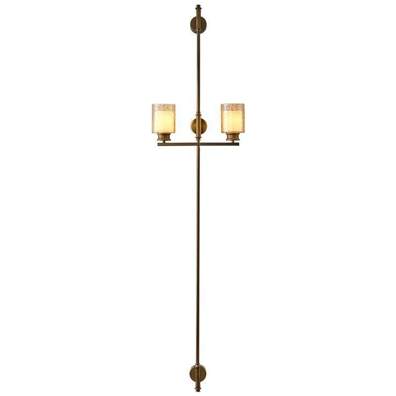 Vertical Brass Dual Glass Cylinder Wall Lamp with Strap Detail | Thrascher